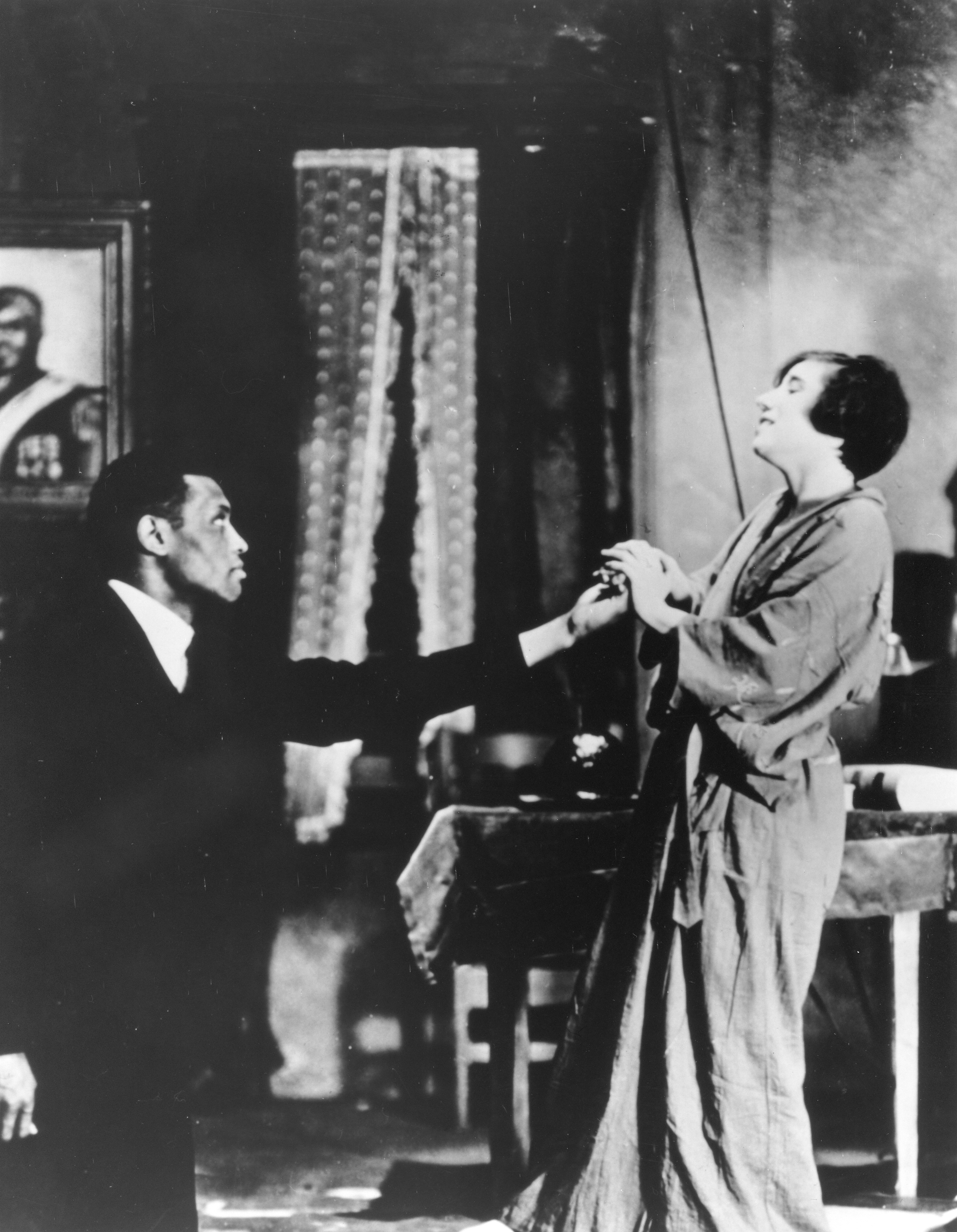 Scene in O'Neill's All God's Chillun' Got Wings in which Paul Robeson kissed Mary Blair's hand and created a national uproar. (1931)
